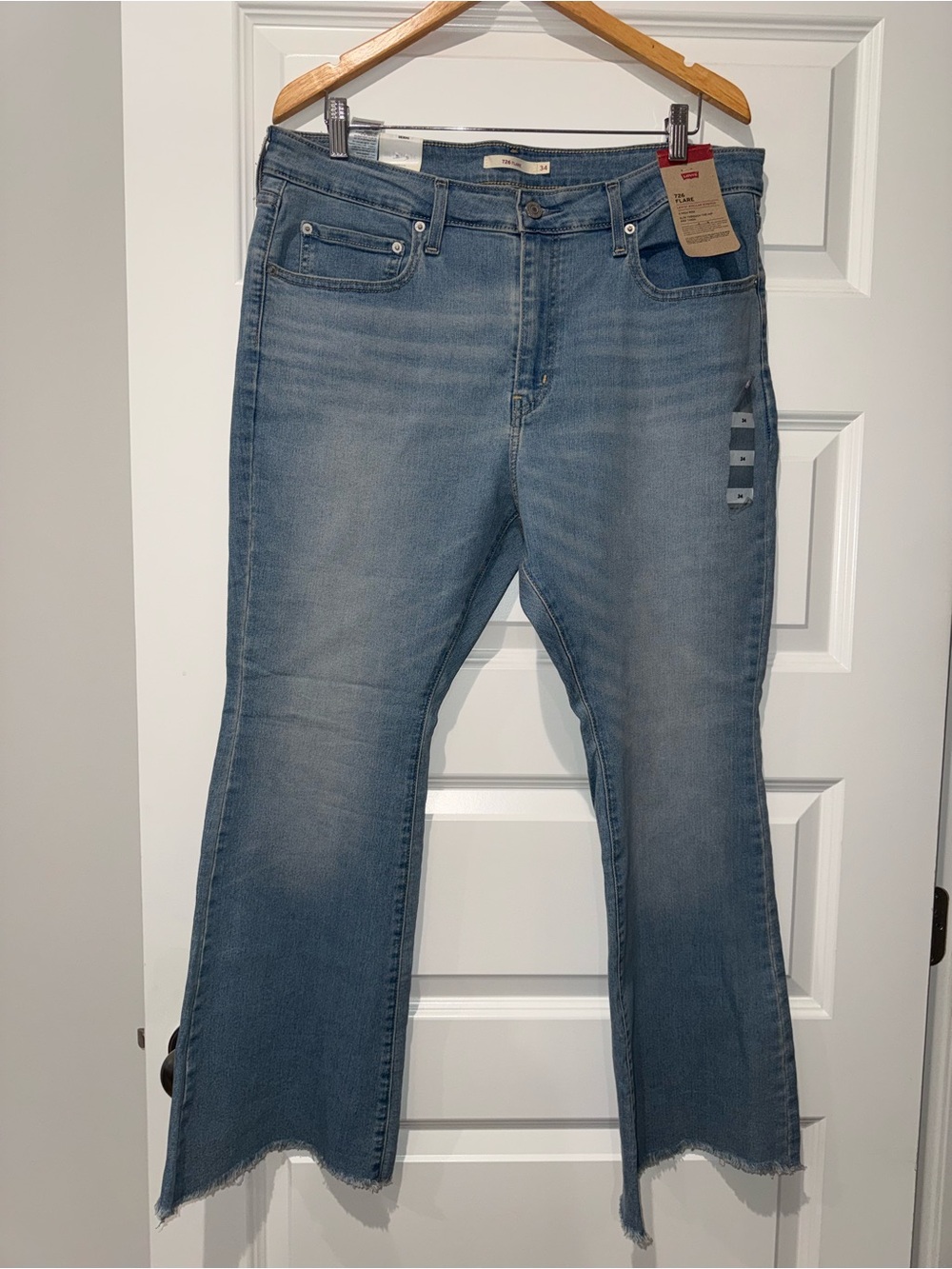 Levi's Light Blue Flare Jeans with Frayed Hem 34x30